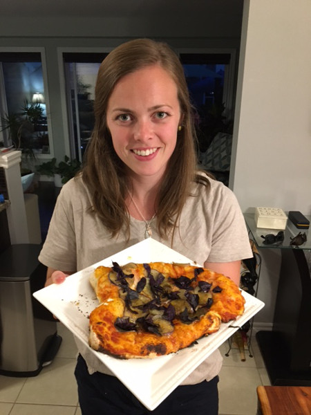 Taryn Aarssen showing off her eggplant pizza