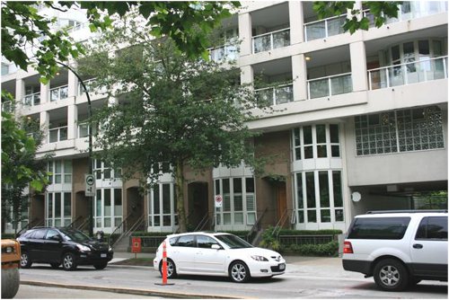 Tower and podium design - townhouses with their own front doors on the street, combined with a narrow tower (upper left).