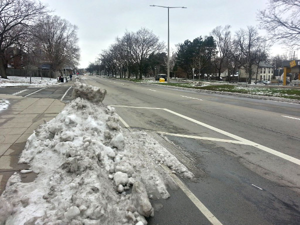 Snow piled high on bike lane (Image Credit: Ryan McGreal)